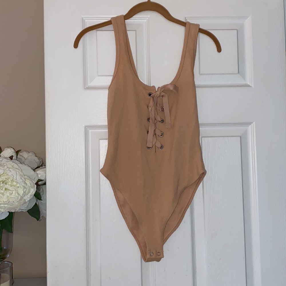 Forever 21 Peach lace up bodysuit size small